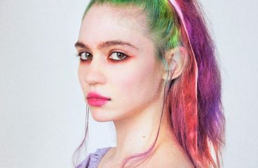 Grimes Reveals She's Pregnant with Elon Musk In Extremely NSFW Photo