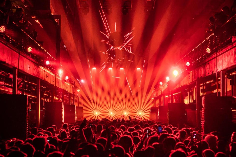 Hundreds of party-goers dance in one of the top UK clubs, Printworks.